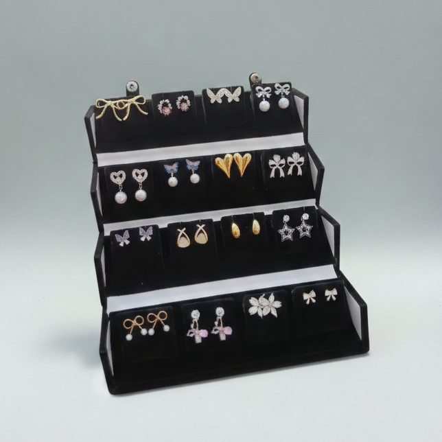 Set of 16 random stud earrings arranged in a premium folding jewellery gift box by ALVINA